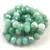 Firepolished donut bead - 6x8mm - Green Marble Blend - sold on strand
