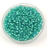 Toho Round Japanese Seed Bead  -  954  -  Lt. Jonquil Lined Aqua  -  size: 11/0